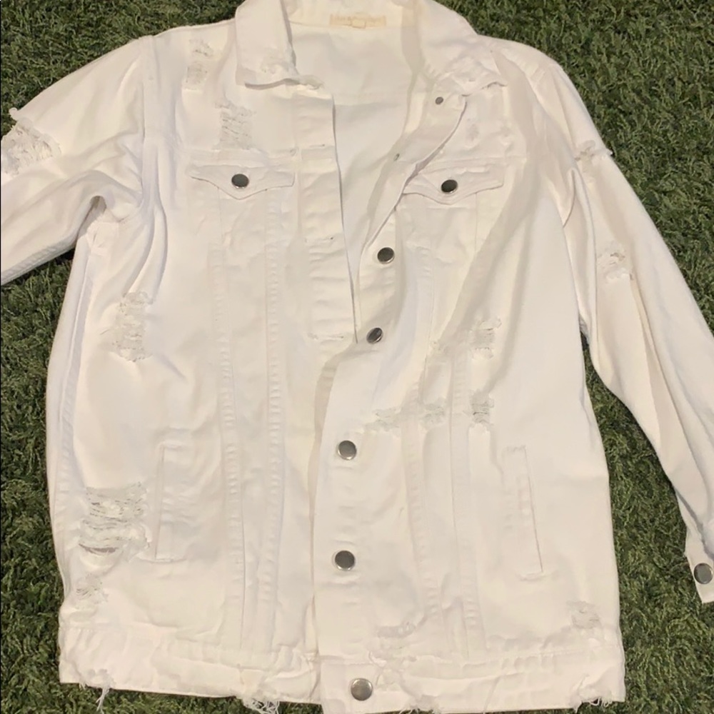 Oversized white distressed denim jacket